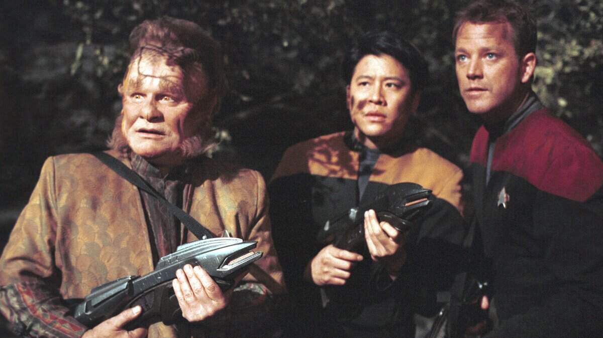Garrett Wang as Ensign Harry S.L. Kim, center, makes an appearance in Raleigh on Saturday.