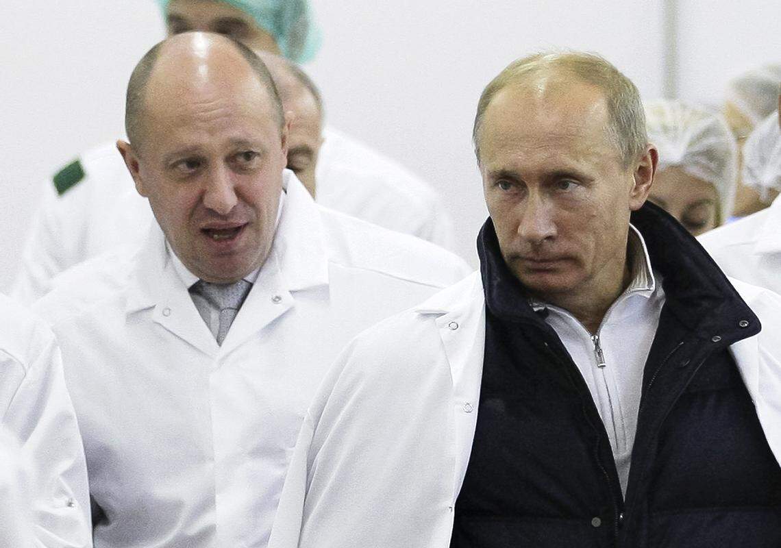 In this 2010 file photo, businessman Yevgeny Prigozhin, left, shows Russian President Vladimir Putin, around his factory which produces school meals. Indicted for alleged U.S. election interference, Prigozhin is a wealthy Russian entrepreneur from St. Petersburg who’s been dubbed “Putin’s chef” by Russian media.