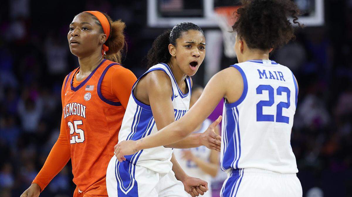 Riley Nelson (4) of the Duke Blue Devils reacts after a 3-point basket by Taina Mair (22) against the Clemson Tigers during the second quarter of their Women's ACC Tournament quarterfinal at Gas South Arena on March 6, 2026 in Duluth, Georgia.