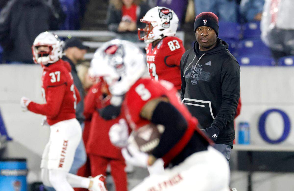 Freddie Aughtry-Lindsay watches as the teams warms up before N.C. State’s game against ECU in the Military Bowl at Navy-Marine Corps Memorial Stadium in Annapolis, Md., Saturday, Dec. 28, 2024.