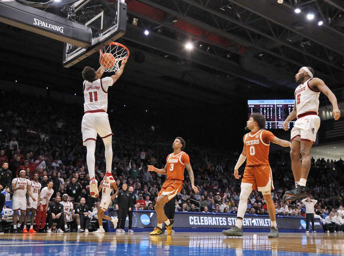 N.C. State’s Quadir Copeland slams in two during the second half of the Wolfpack’s 68-66 loss to Texas in the NCAA First Four on Tuesday, March 17, 2026, at the University of Dayton Arena in Dayton, Ohio. 