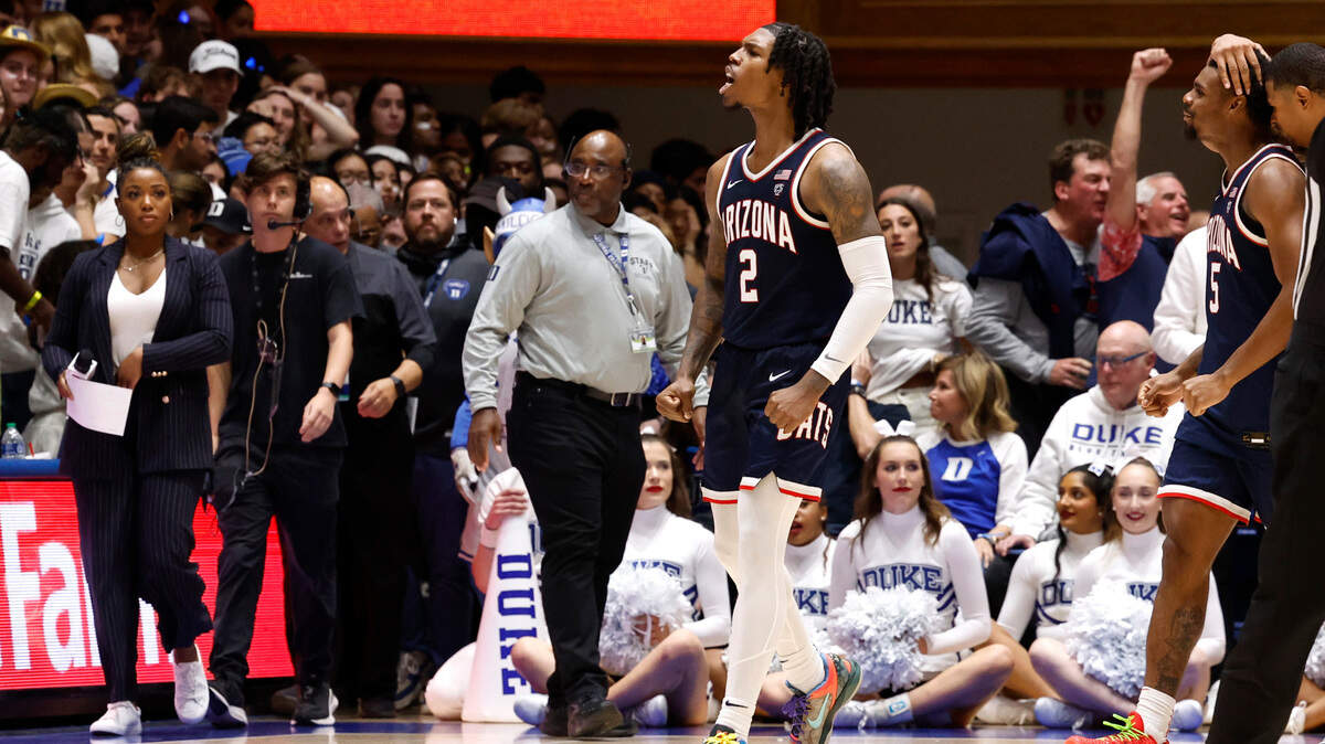 Arizona’s Caleb Love (2) celebrates as time runs out during Arizona’s 78-73 victory over Duke at Cameron Indoor Stadium in Durham, N.C., Friday, Nov. 10, 2023.