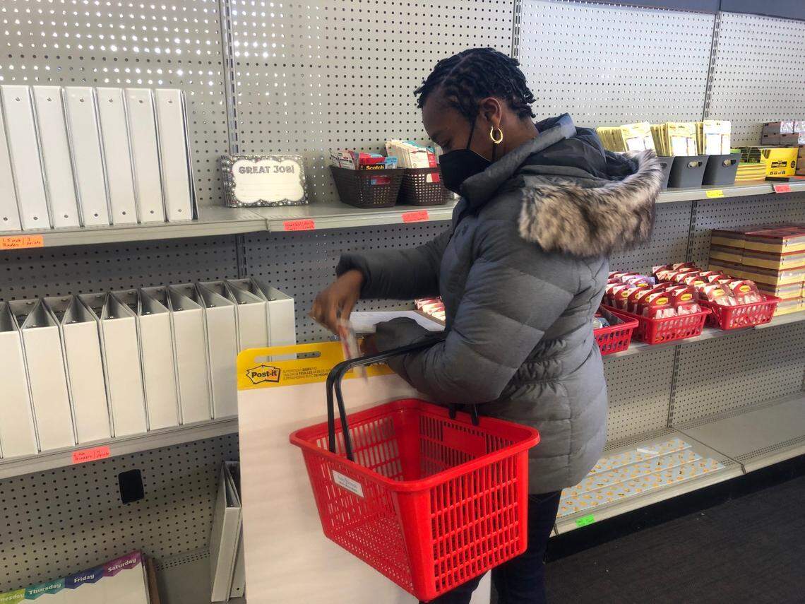 Shnita Horton, a kindergarten teacher at Wilburn Elementary School, shops for free classroom supplies at the grand opening of WakeEd Partnership’s Tools4Schools store in Cary, N.C., on Jan. 18, 2022.
