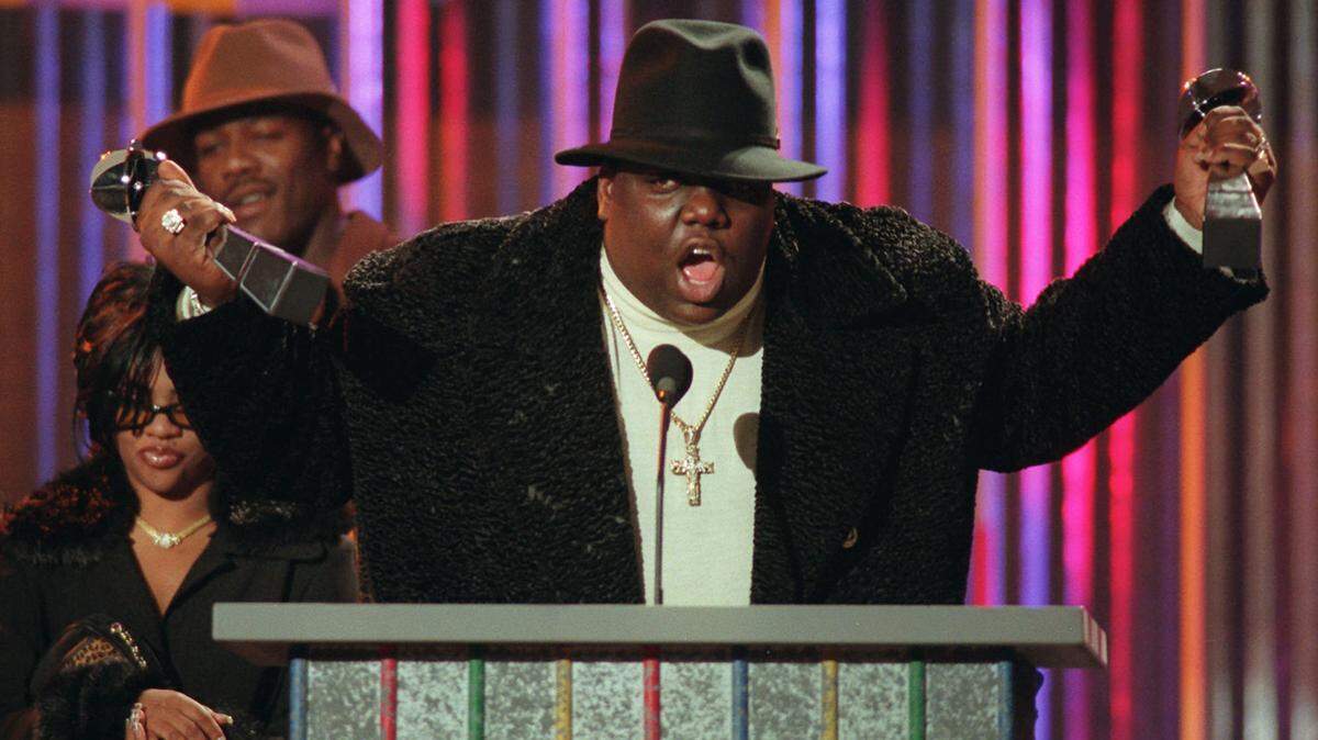 Notorious B.I.G., pictured at the Billboard Music Awards Dec. 6, 1995, was killed 1997. His murder remains a subject of fascination.