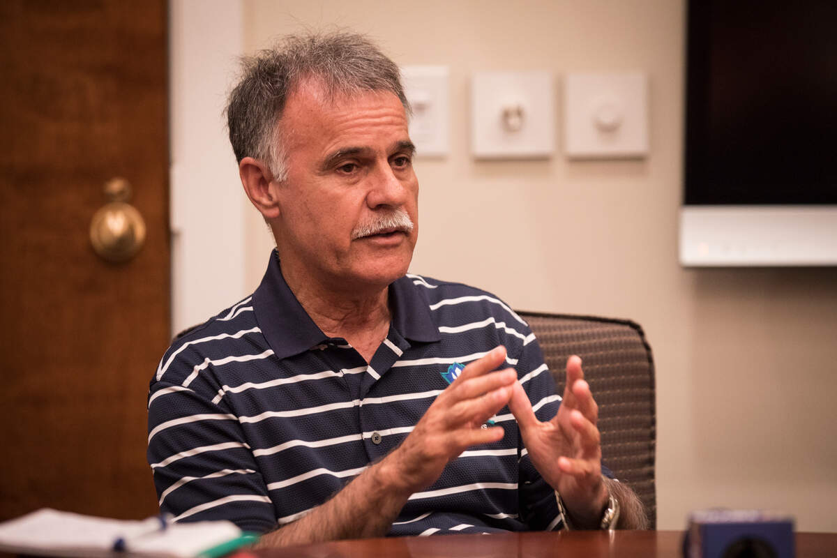 Jose Sartarelli, chancellor of UNC Wilmington, speaks with journalists in Alderman Hall about the state of the school’s campus and when it will re-open on Friday, Sept. 21, 2018.