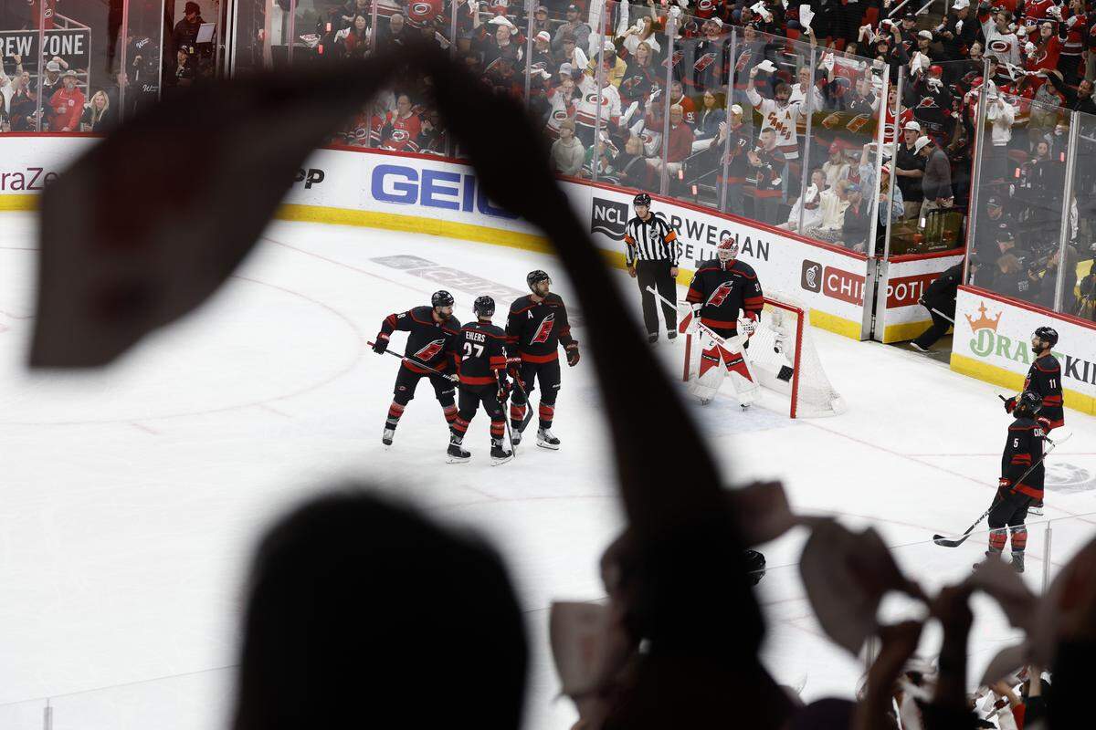 Fans cheer on the Canes in the third period of the Hurricanes’ game against the Canadiens in game two of the Eastern Conference Finals at the Lenovo Center in Raleigh, N.C., Saturday, May 23, 2026.