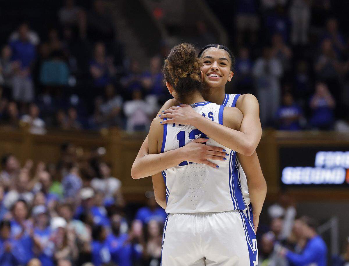 Duke’s Arianna Roberson and Delaney Thomas embrace as time expires during the Blue Devils’ 69-46 second-round NCAA Tournament win over Baylor on Sunday, March 22, 2026, at Cameron Indoor Stadium in Durham, N.C.