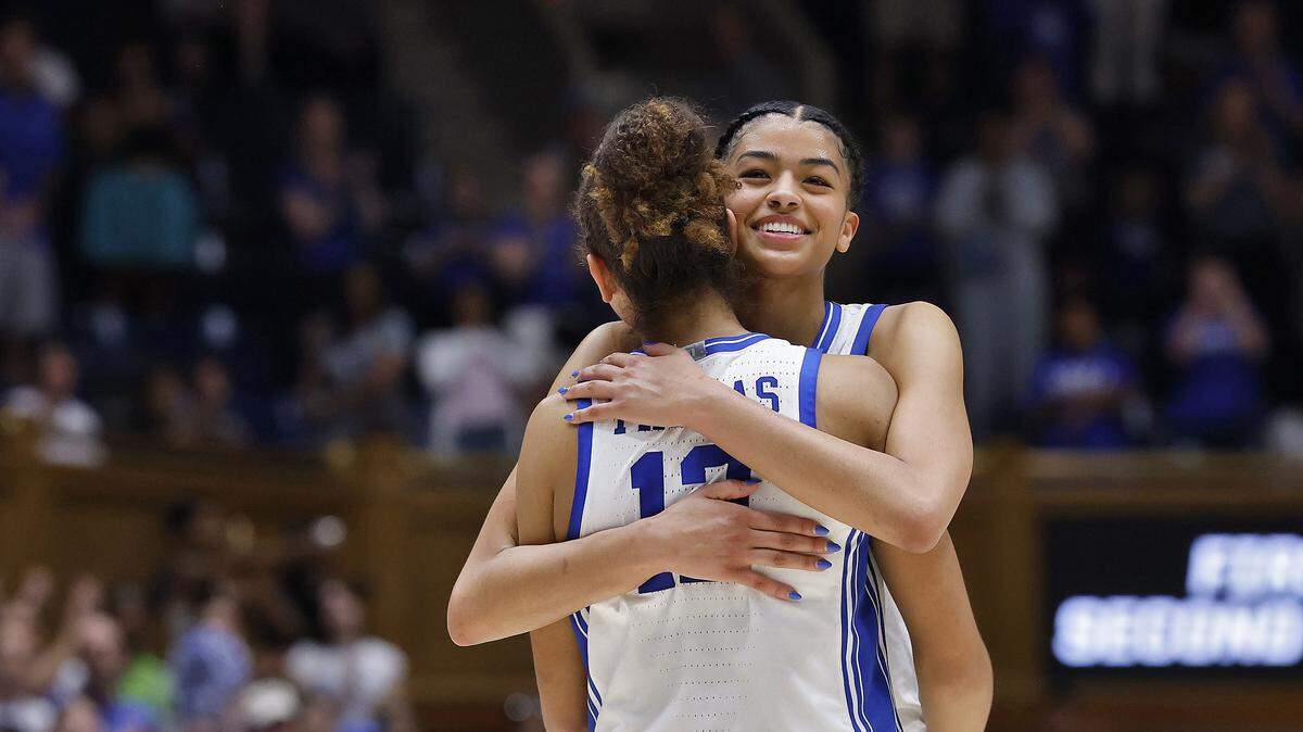 Duke’s Arianna Roberson and Delaney Thomas embrace as time expires during the Blue Devils’ 69-46 second-round NCAA Tournament win over Baylor on Sunday, March 22, 2026, at Cameron Indoor Stadium in Durham, N.C.