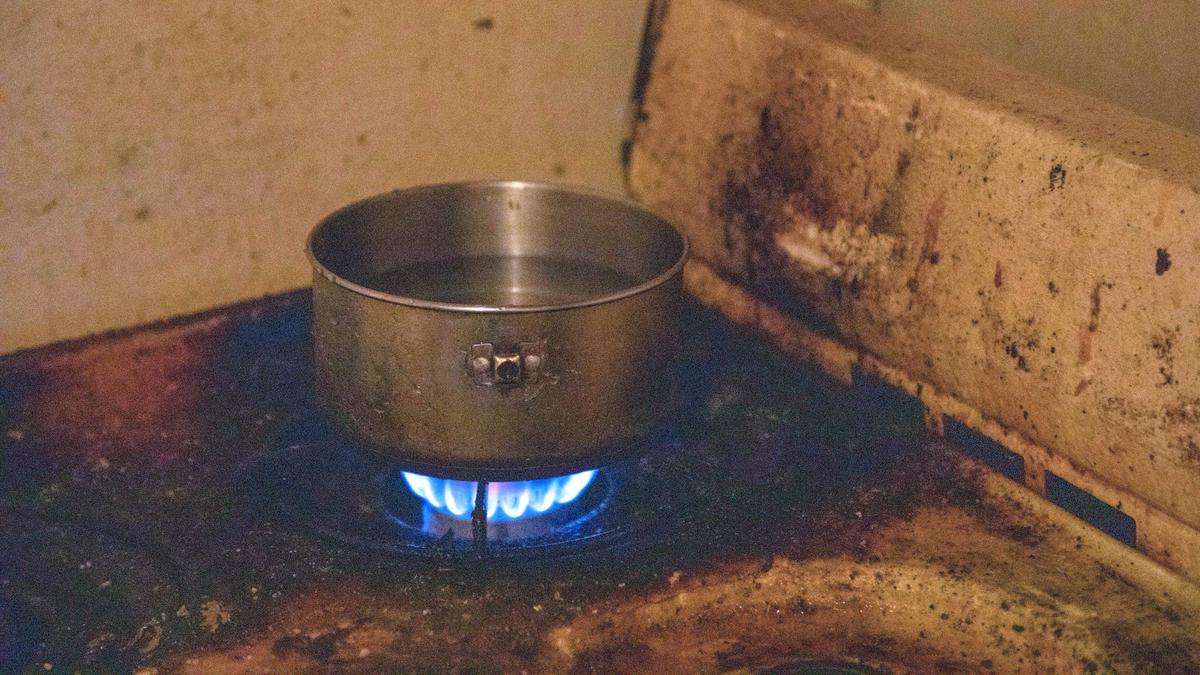 Water boils to cook macaroni noodles on the stove that Brittany Brown, 28, believes to be leaking carbon monoxide and the cause of her infant son Britan’s death on Dec. 8, 2019, in Brown’s apartment at McDougald Terrace, on Friday, Jan. 3, 2020, in Durham, N.C.