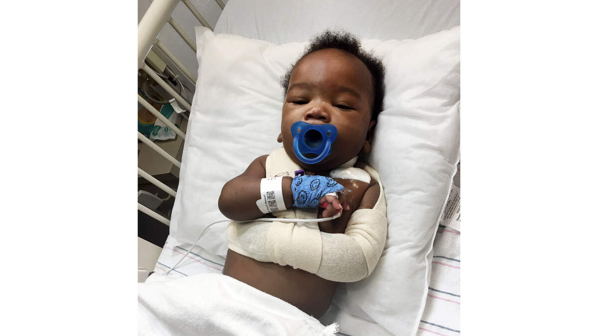 A Wake County jury awarded Naqah Lake, pictured above after surgery about six months after he was born, and his mother $18.2 million in a medical malpractice lawsuit against WakeMed and one of its providers.