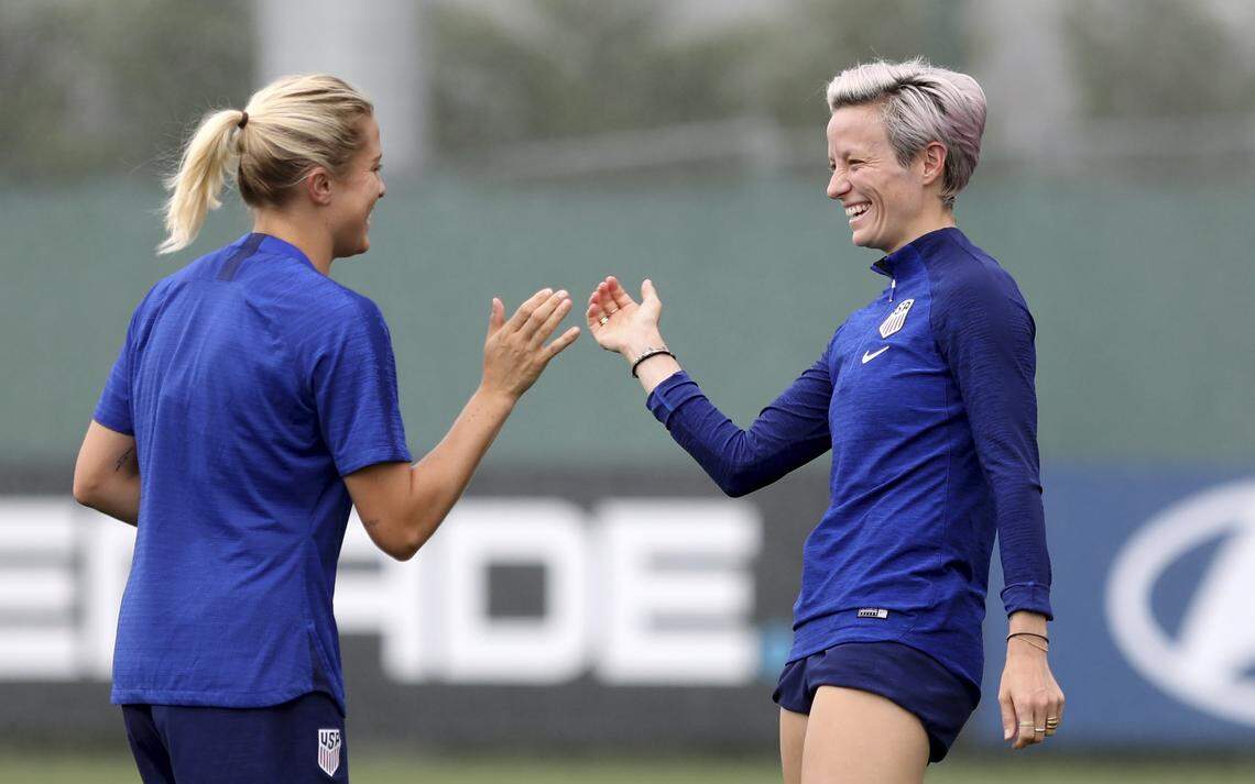 United States’ Abby Dahlkemper, left, and Megan Rapinoe share a laugh during a training session of the US Women’s Soccer team at a training ground in Lyon, France, Monday, July 1, 2019. The US will face England in a Women’s World Cup semifinal match Tuesday in Lyon. (AP Photo/Laurent Cipriani)