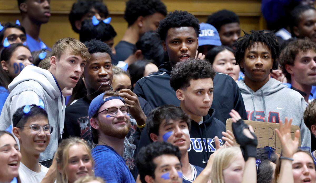 From left Duke recruits Cooper Flagg, VJ Edgecombe, Patrick Ngongba II,Isaiah Evans and Darren Harris, in front, watch the Blue Devils’ scrimmage during Duke basketball’s Countdown to Craziness at Cameron Indoor Stadium in Durham, N.C., Friday, Oct. 20, 2023.