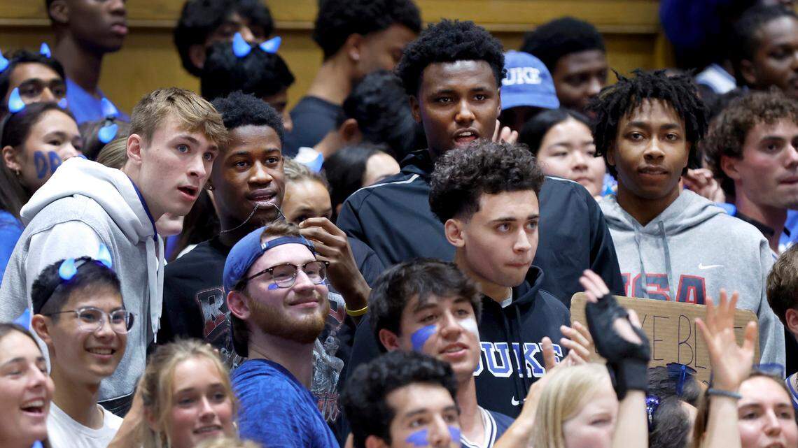 From left Duke recruits Cooper Flagg, VJ Edgecombe, Patrick Ngongba II,Isaiah Evans and Darren Harris, in front, watch the Blue Devils’ scrimmage during Duke basketball’s Countdown to Craziness at Cameron Indoor Stadium in Durham, N.C., Friday, Oct. 20, 2023.