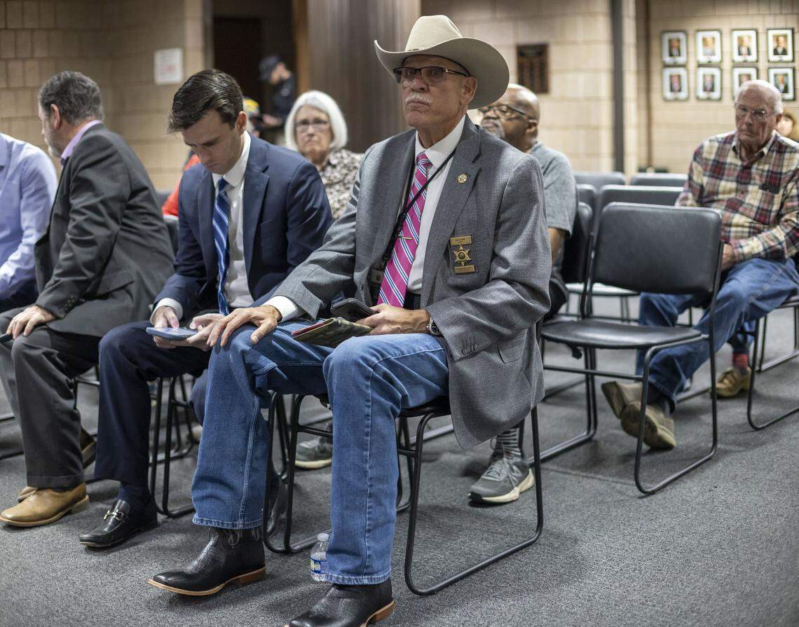 Rockingham County Sheriff Sam Page, candidate for N.C. Senate, takes a seat on the front row during a count of provisional ballots in his race against Senate President Pro Tempore Phil Berger on Friday, March 6, 2026 in Reidsville, N.C.