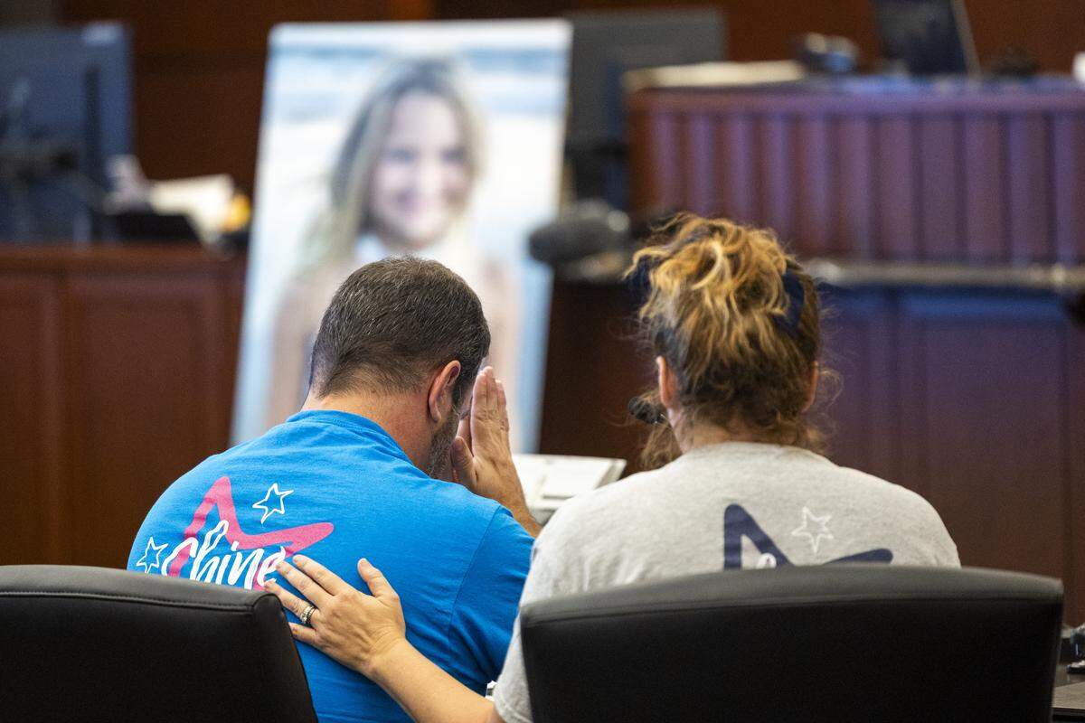 Trey Brooks, left, reads a victim impact statement beside his wife April Brooks in Wake County Superior Court on Monday. Landen Glass pleaded guilty to felony obstruction of justice, misdemeanor death by vehicle and a weapons charge in the 2022 Raleigh Christmas Parade crash that killed their 11-year-old daughter Hailey Brooks. Glass was 20 at the time and his plea deal calls for him to serve about eight months behind bars.