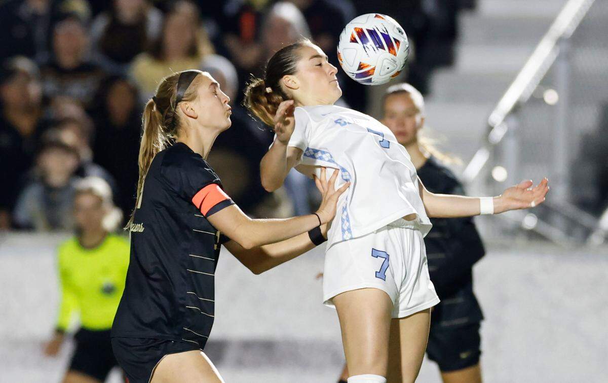 North Carolina’s Linda Ullmark (7) controls the ball in front of Wake Forest’s Laurel Ansbrow (34) during the first half of UNC’s game against Wake Forest in the finals of the 2024 Women’s College Cup at WakeMed Soccer Park in Cary, N.C., Monday, Dec. 9, 2024.
