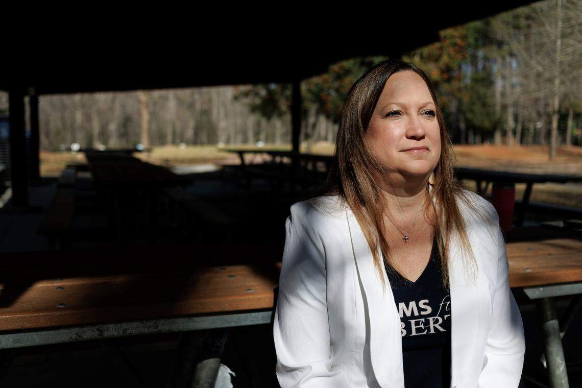 Julie Page, Wake County Chapter chair of Moms for Liberty, stands for a portrait in Garner, N.C. on Wednesday, Feb. 15, 2023.