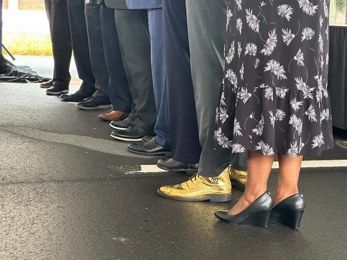 Apex Mayor Jacques Gilbert wore his gold shows when he helped cut the ribbon at a ceremony Tuesday marking completition of N.C. 540. An 18-mile stretch of the six-lane toll road opens to the public Wednesday morning, Sept. 25, 2024.