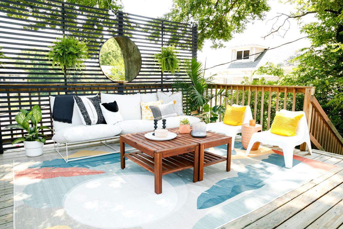 Plants can add a hint of color to almost any design in your space, HGTV’s Carmeon Hamilton told The News & Observer. This photo shows an example of an outdoor living space Hamilton designed.