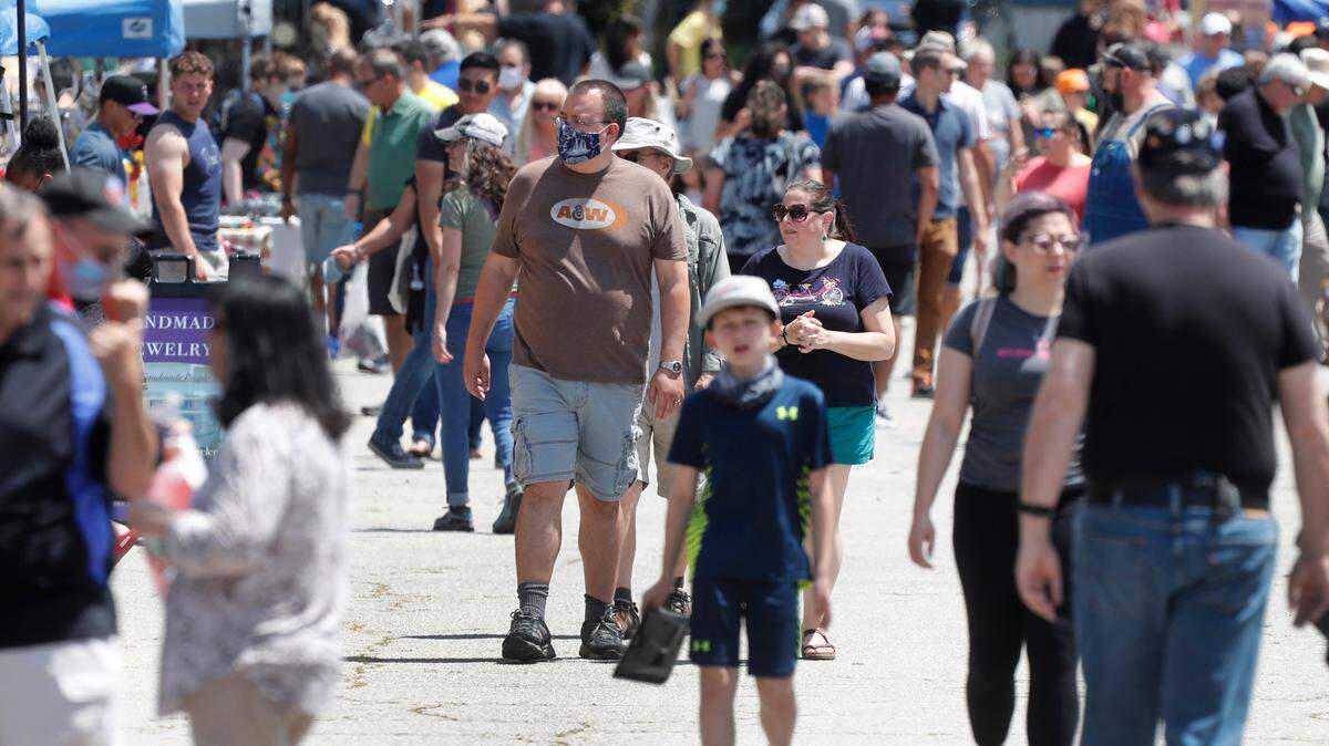Crowds shop at The Raleigh Market at the N.C. State Fairgrounds in Raleigh, N.C., Saturday, May 15, 2021.