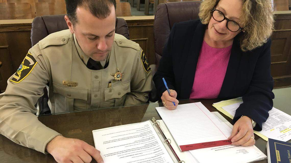 Assistant District Attorney Melissa Pelfrey and Warren County Sheriff’s Lt. Ben Jackson work to prosecute Michael Steven Elder for the 2007 rape and kidnapping of an 80-year-old woman.