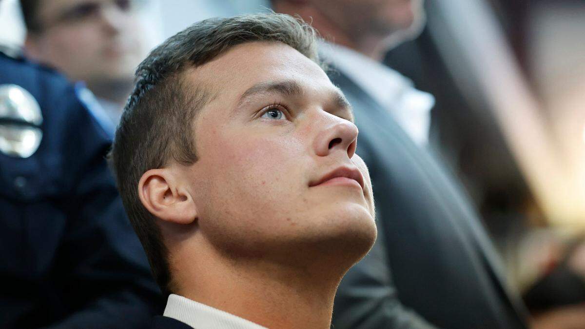 Rep. Madison Cawthorn listens to a question while speaking to the media and supporters at his election campaign headquarters in Hendersonville, N.C., Tuesday, May 17, 2022.