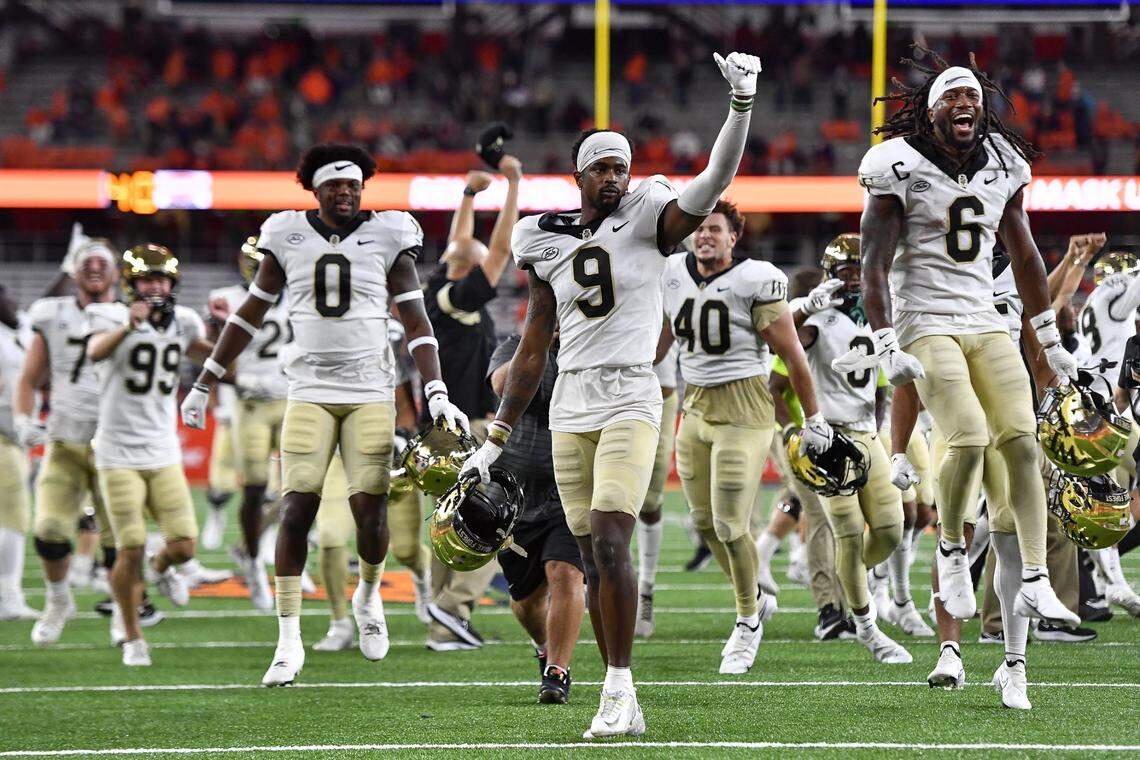 Wake Forest wide receiver A.T. Perry (9) reacts after his touchdown in overtime was confirmed in an NCAA college football game against Syracuse in Syracuse, N.Y., Saturday, Oct. 9, 2021. Wake Forest won 40-37.