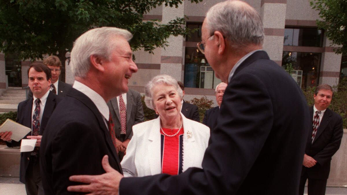 During his 45 years covering politics for The N&O, Rob Christensen covered both Gov. Jim Hunt and Sen. Jesse Helms, shown in this file photo with Helms’ wife Dorothy.