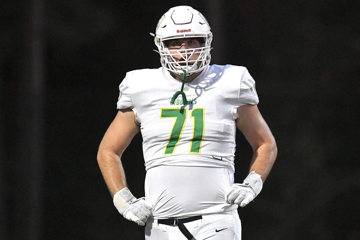 Cardinal Gibbons offensive tackle Jack Sheehan (71) rests a moment during pre-game drills before their game wirth Leesville Road. The Leesville Road Pride and the Cardinal Gibbons Crusaders met in a conference football game in Raleigh, N.C. on November 1, 2024.