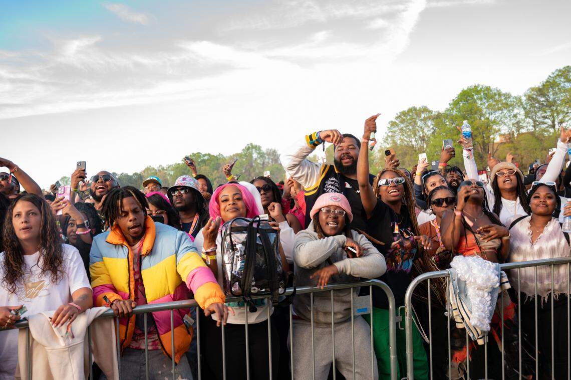 Fans dance during Jeezy’s set at the second day of Dreamville Festival in Raleigh, N.C. on Sunday, April 7, 2024.