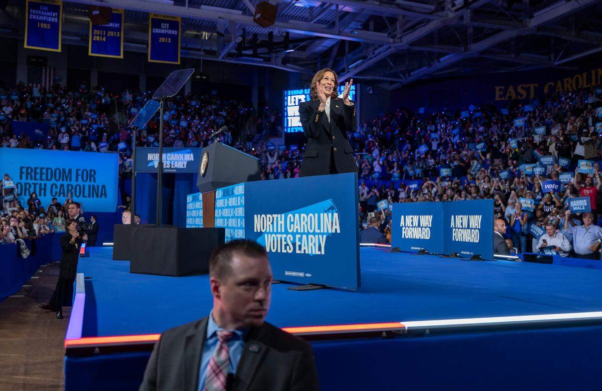 Supporters of Vice President Kamala Harris, the Democratic Presidential nominee, concludes her remarks during a rally on Sunday, October 13, 2024 at Minges Coliseum in Greenville, N.C.