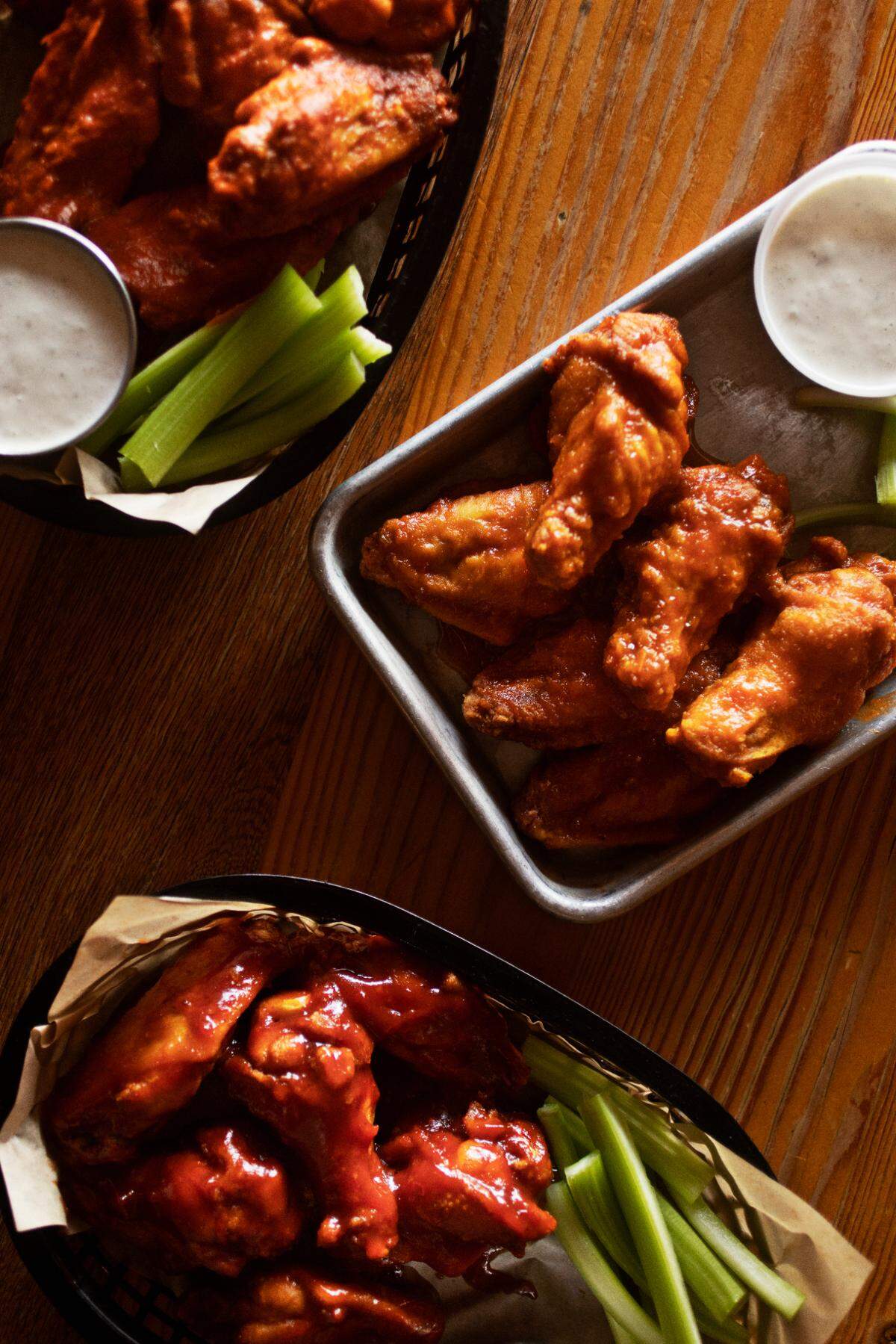 The Wooden Nickel in Hillsborough serves wings with a variety of sauces to choose from, including a beer sauce made from a local rotating beer on tap.