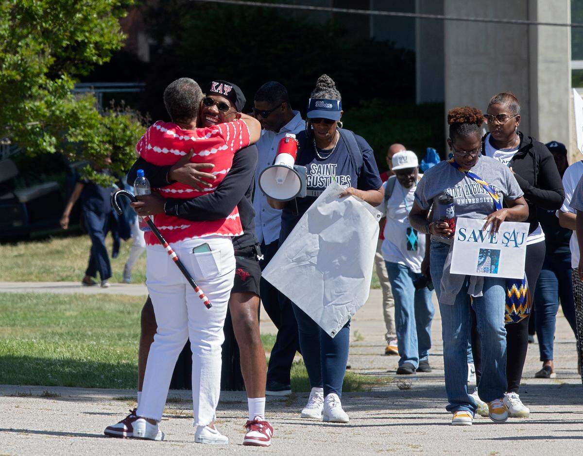 People gather during a rally to save St. Augustine’s University in Raleigh, N.C. on Monday, April 29, 2024. The event was organized by the Capital City Hope Foundation, Falcons Unite, and the SAVESAU Coalition.