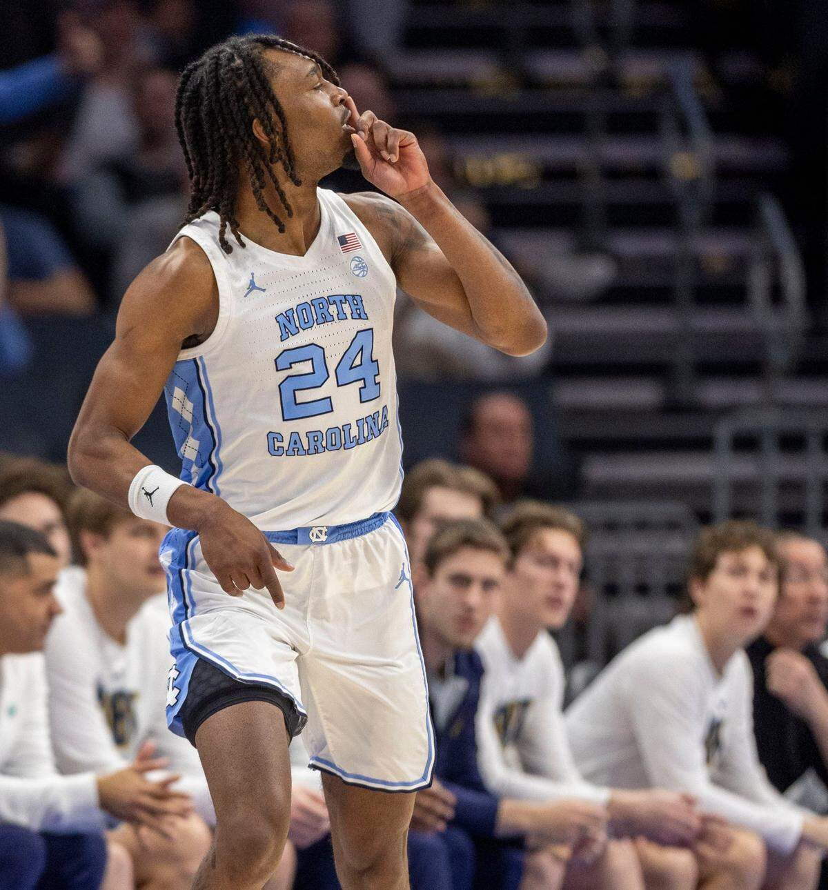 North Carolina forward Jae’Lyn Withers (24) reacts after sinking a three-point basket in the first half against Notre Dame to give the Tar Heels a 12 point lead on Wednesday, March 12, 2025 during the second round of the ACC Tournament at Spectrum Center in Charlotte, N.C.