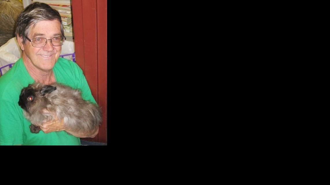 Bob Betts with one of his beloved bunnies, Nigel.
