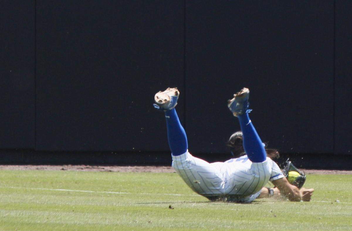 Duke infielder Aminah Vega lays out to field a fly ball during the NCAA Tournament regional final against Arizona at Smith Family Stadium on May 17, 2026.