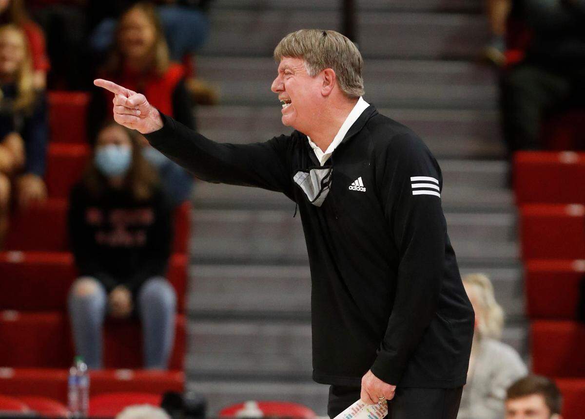 N.C. State head coach Wes Moore yells to his players during the first half of N.C. State’s game against Georgia at Reynolds Coliseum in Raleigh, N.C., December 16, 2021.