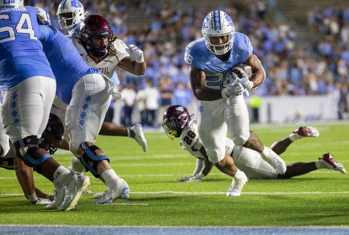 North Carolina running back Omarion Hampton (28) breaks into the open a 4-yard touchdown run in the fourth quarter to give the Tar Heels a 31-10 lead over N.C. Central on Saturday, September 14, 2024 at Kenan Stadium in Chapel Hill, N.C.