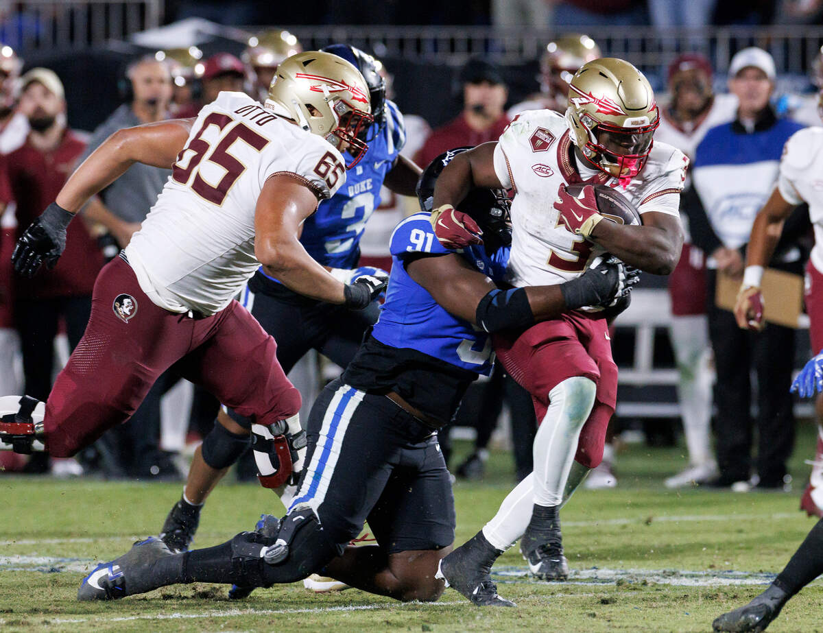 Duke’s Kendy Charles pressures Florida State’s Kam Davis during the second half of the Blue Devils’ 23-16 win on Friday, Oct. 18, 2024, at Wallace Wade Stadium in Durham, N.C.