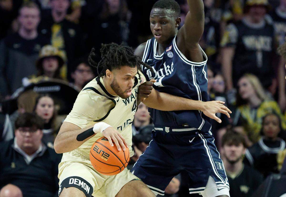 Duke’s Khaman Maluach (9) defends Wake Forest’s Efton Reid III (4) during the first half of Duke’s game against Wake Forest at LJVM Coliseum in Winston-Salem, N.C., Saturday, Jan. 25, 2025.