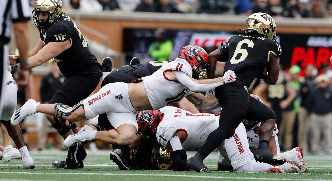 N.C. State linebacker Payton Wilson (11) tackles Wake Forest running back Justice Ellison (6) during the first half of N.C. State’s game against Wake Forest at Allegacy Stadium in Winston-Salem, N.C., Saturday, Nov. 11, 2023.