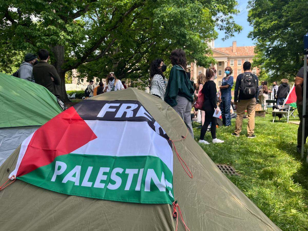 Students and others pitched tents on the campus of UNC-Chapel Hill Friday, protesting Israel’s actions in the Gaza Strip and forming an encampment similar to others formed on college campuses nationwide.