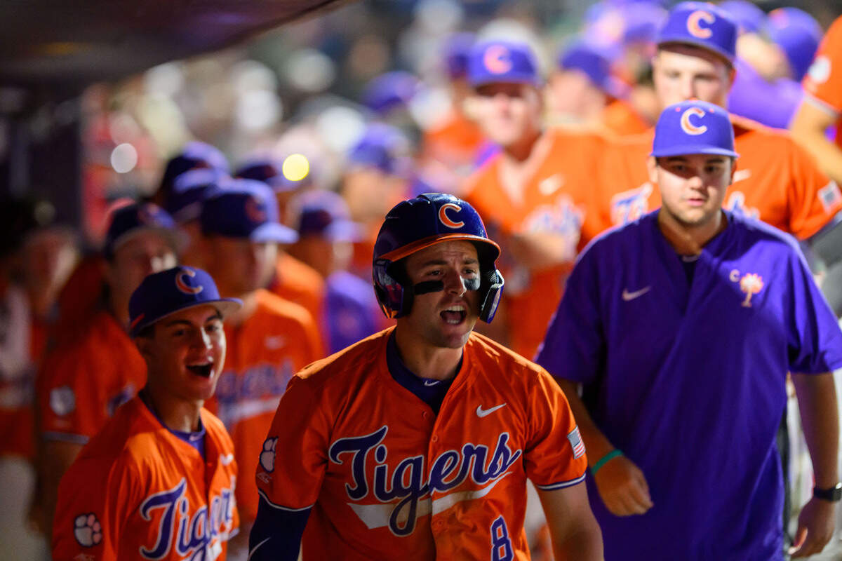 Clemson infielder Josh Paino (8) celebrates in the dugout after the Tigers defeated NC State, 7-6, on Thursday, May 22, 2025, in the ACC Baseball Championship at Durham Bulls Athletic Park in Durham, N.C.