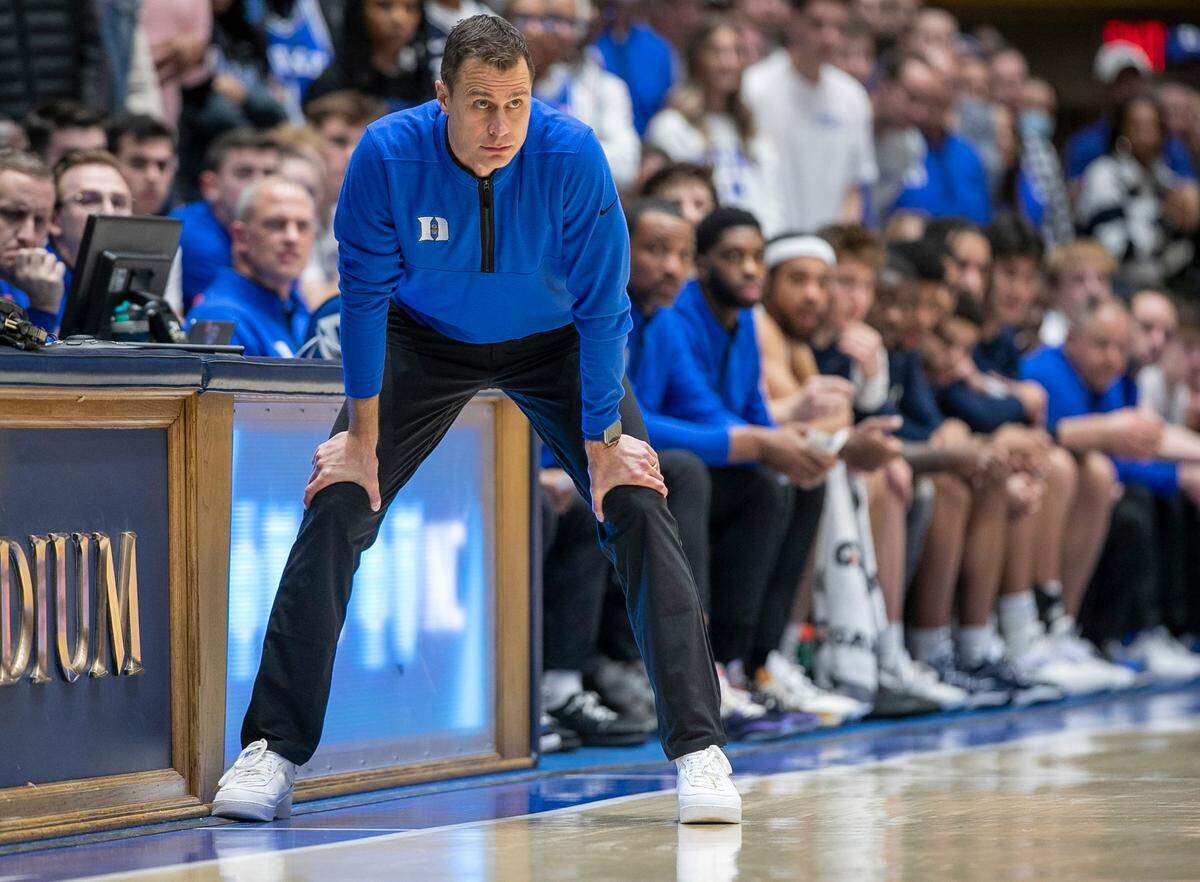 Duke coach Jon Scheyer watches his team on offense in the first half against North Carolina on Saturday, February 4, 2023 at Cameron Indoor Stadium in Durham, N.C