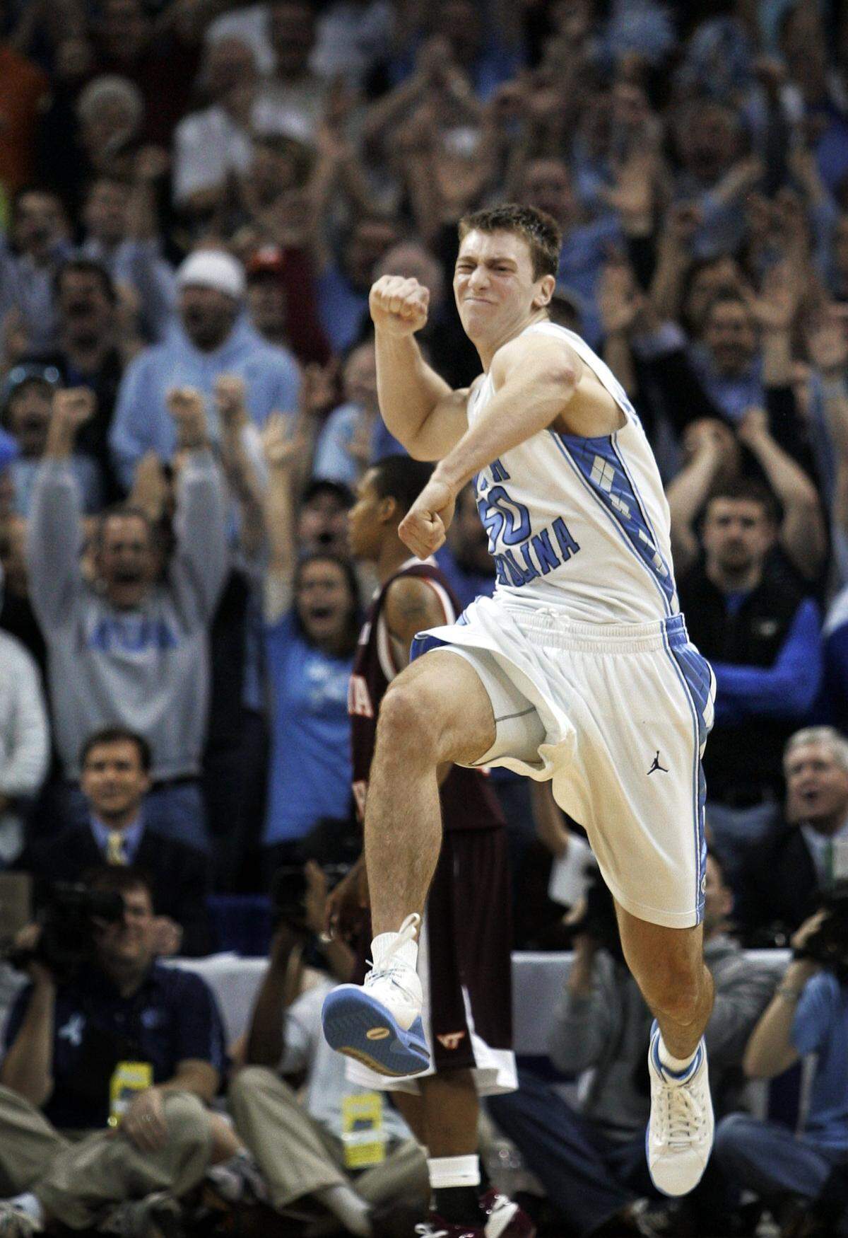 UNC's Tyler Hansbrough celebrates after scoring two to put the Tar Heels up 68-66 to beat Virginia Tech in the closing seconds of their semifinal game of the ACC Men's Basketball Tournament, at Charlotte Bobcats Arena, on Saturday, March 15, 2008.