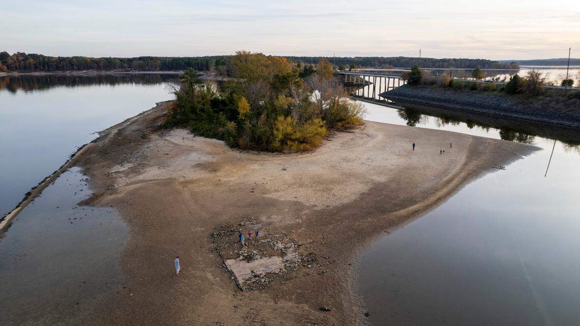 An old roadbed that was part of community in the New Hope Valley before they were flooded upon Jordan Lake’s 1982 completion are visible Tuesday, Nov. 15, 2023 in Chapel Hill. Jordan Lake is more than four feet below the lake’s 216.08 median water height above sea level over the past 29 years, and about 2.5 feet below the lake’s height last year.