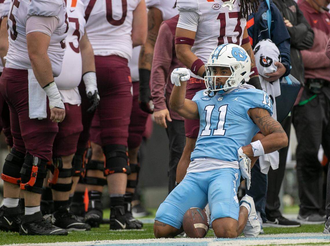 North Carolina wide receiver Josh Downs (11) reacts after a 24-yard pass completion from quarterback Drake Maye in the second quarter against Virginia Tech on Saturday, October 1, 2022 at Kenan Stadium in Chapel Hill, N.C.