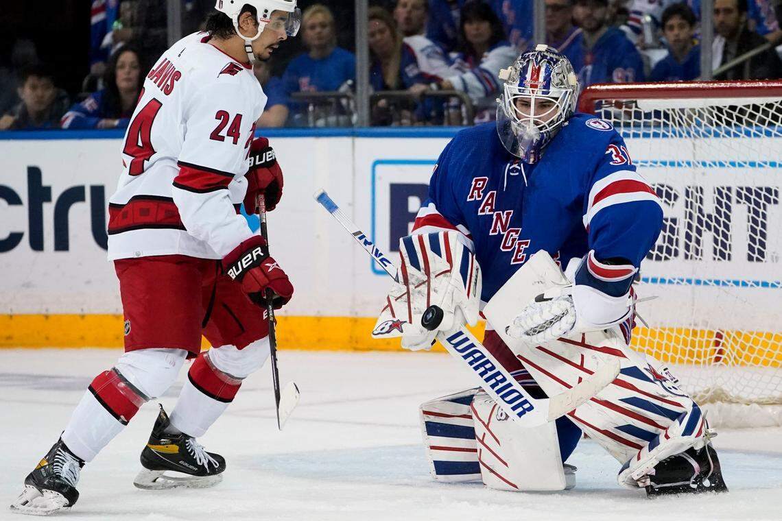 New York Rangers goaltender Igor Shesterkin (31) makes a save against Carolina Hurricanes center Seth Jarvis (24) during the second period of Game 6 of an NHL hockey Stanley Cup second-round playoff series, Saturday, May 28, 2022, in New York. (AP Photo/John Minchillo)