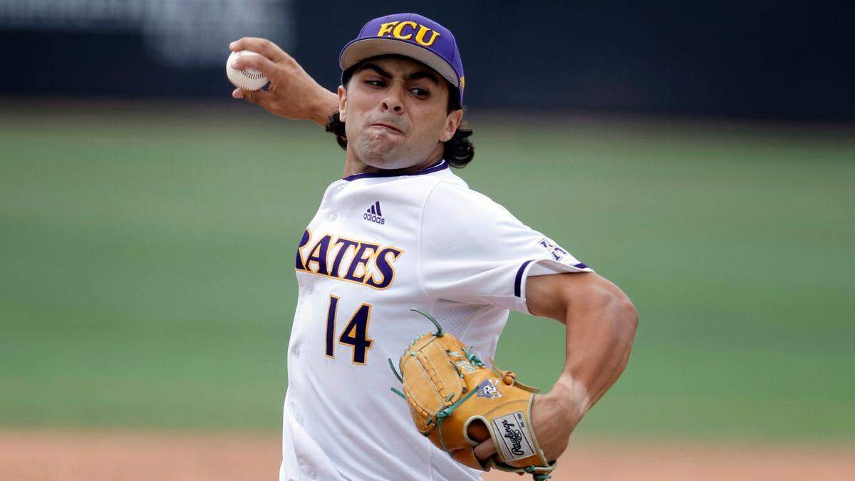 East Carolina’s Zach Agnos (14) pitches during ECUís 13-7 victory over Texas in the Greenville Super Regional at Clark-LeClair Stadium Friday, June 10, 2022.