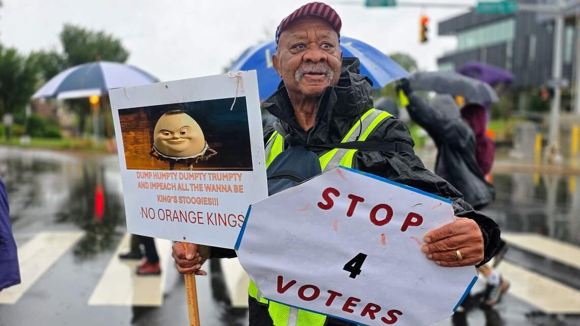 Despite rain, No Kings protesters march to early voting sites across NC
